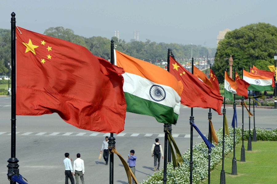 Indian and Chinese national flags flutter side by side at the Raisina hills in New Delhi, India, in this file photo. [PhotoXinhua].jpeg